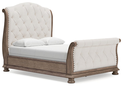Ardenfield Queen Upholstered Sleigh Bed with Mirrored Dresser