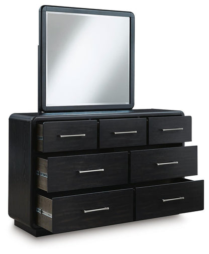 Rowanbeck King Upholstered Panel Bed with Mirrored Dresser