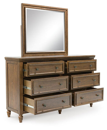 Sturlayne King Upholstered Panel Bed, Dresser, Mirror, Chest and Nightstand